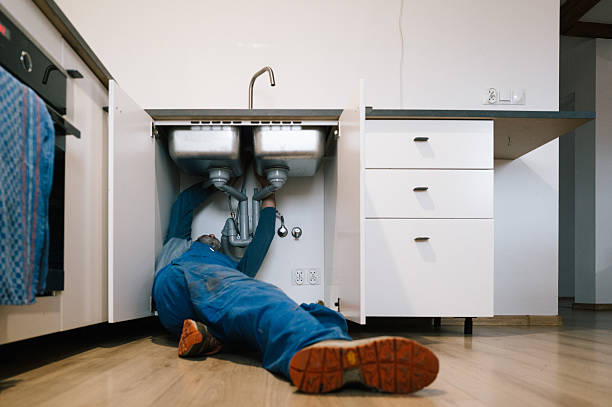 Professional Drain Cleaning technician working in Bryant, WA